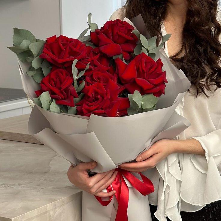 Corporate meeting room with carefully timed floral arrangements that maintain elegance throughout business hours